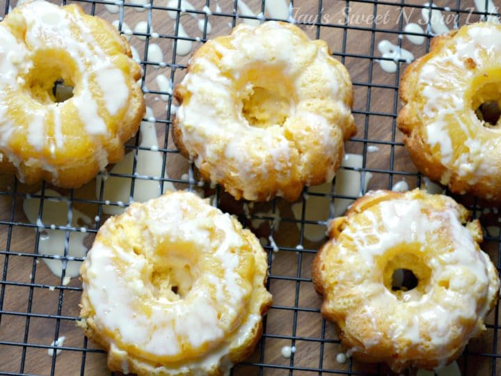 Serve these easy-to-make mini Pineapple Upside Down Cakes at holiday parties, or family get-togethers. This recipe uses a boxed cake mix for a quick and easy dessert recipe. These mini pineapple upside-down cakes are perfect for any time of the year!