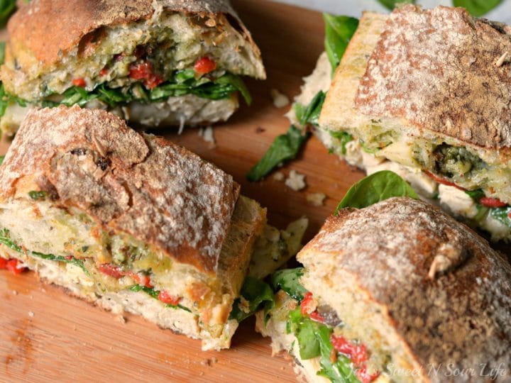 This Tuscan-inspired Chicken Artichoke Ciabatta Sandwich is loaded with roasted red peppers, artichokes, grilled chicken, fresh spinach, deli-sliced provolone cheese, and Pesto sauce. The perfect balance of sweet and savory, it's the perfect way to mix up your normal lunchtime routine.