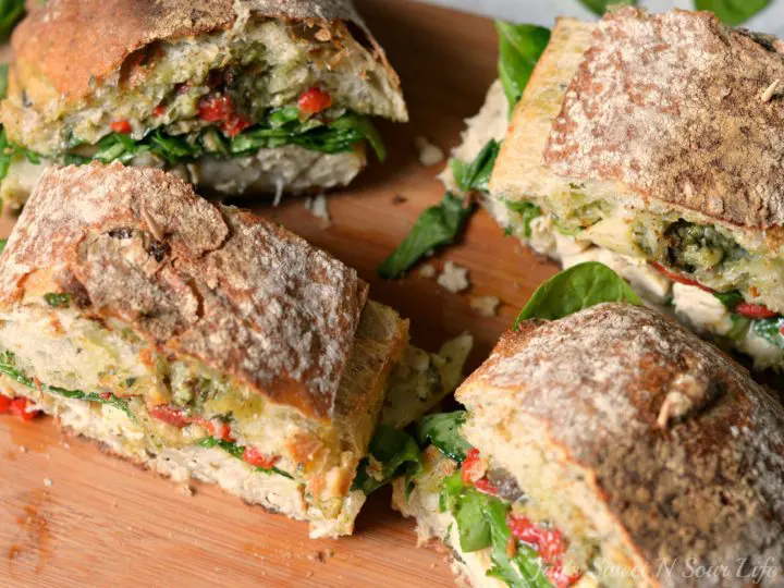 This Tuscan-inspired Chicken Artichoke Ciabatta Sandwich is loaded with roasted red peppers, artichokes, grilled chicken, fresh spinach, deli-sliced provolone cheese, and Pesto sauce. The perfect balance of sweet and savory, it's the perfect way to mix up your normal lunchtime routine.
