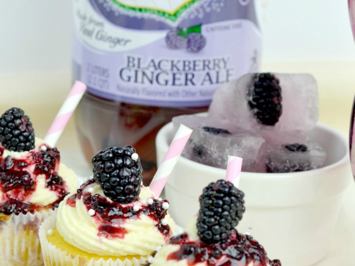A delicious light and fluffy Blackberry Ginger Ale Cupcakes are filled with fresh blackberry filling. Then topped with a homemade cream cheese frosting and more blackberry compote.