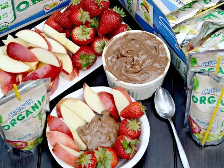 This 3 ingredients Chocolate Fruit Dip is the perfect snack to take with you on the go for family time at the park. It's a delicious refreshing summertime snack that won't weigh you down on a hot summer day.