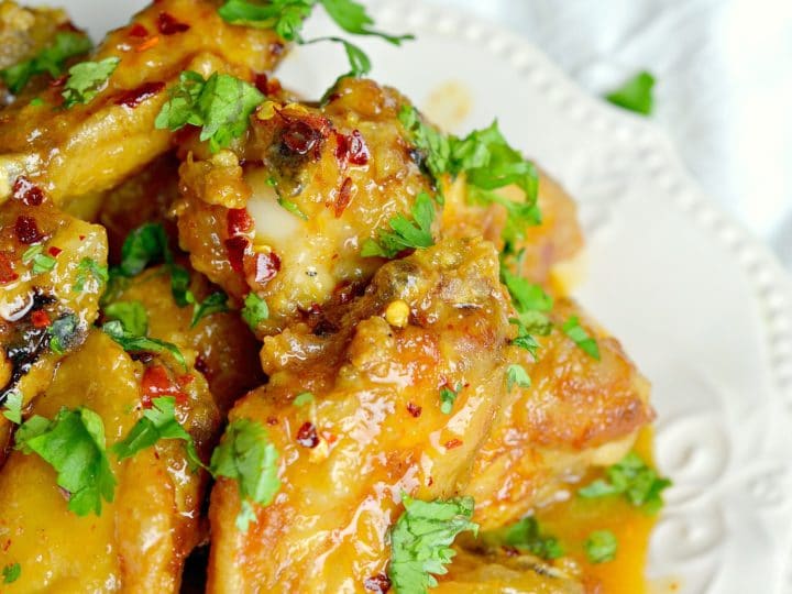 Spicy Buttery Chicken Wings Long Shot Plate. Perfect for any night, these Spicy Buttery Chicken Wings are so easy to make and oh so delicious.