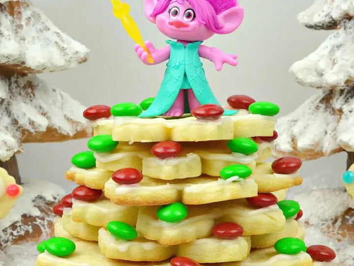 Trolls Holiday Tree Sugar Cookies Poppy. Bake, stack, and decorate these Trolls inspired Sugar Cookies. Decked out in fun Trolls Holiday themed colors, this fun Troll's Sugar Cookie Christmas Tree is a fun recipe and Christmas craft all in one!