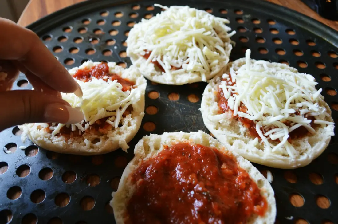 An easy and delicious recipe, this English muffin pizza is the perfect afterschool snack option. Add your favorite toppings and fully customize this mini personal pizza however you want.