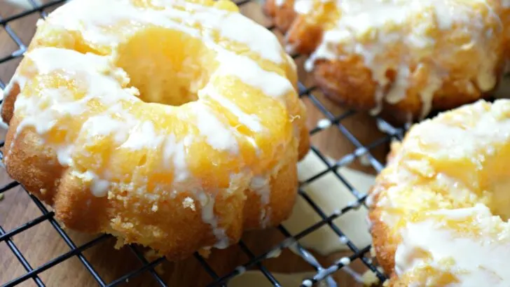 Serve these easy-to-make mini Pineapple Upside Down Cakes at holiday parties, or family get-togethers. This recipe uses a boxed cake mix for a quick and easy dessert recipe. These mini pineapple upside-down cakes are perfect for any time of the year!