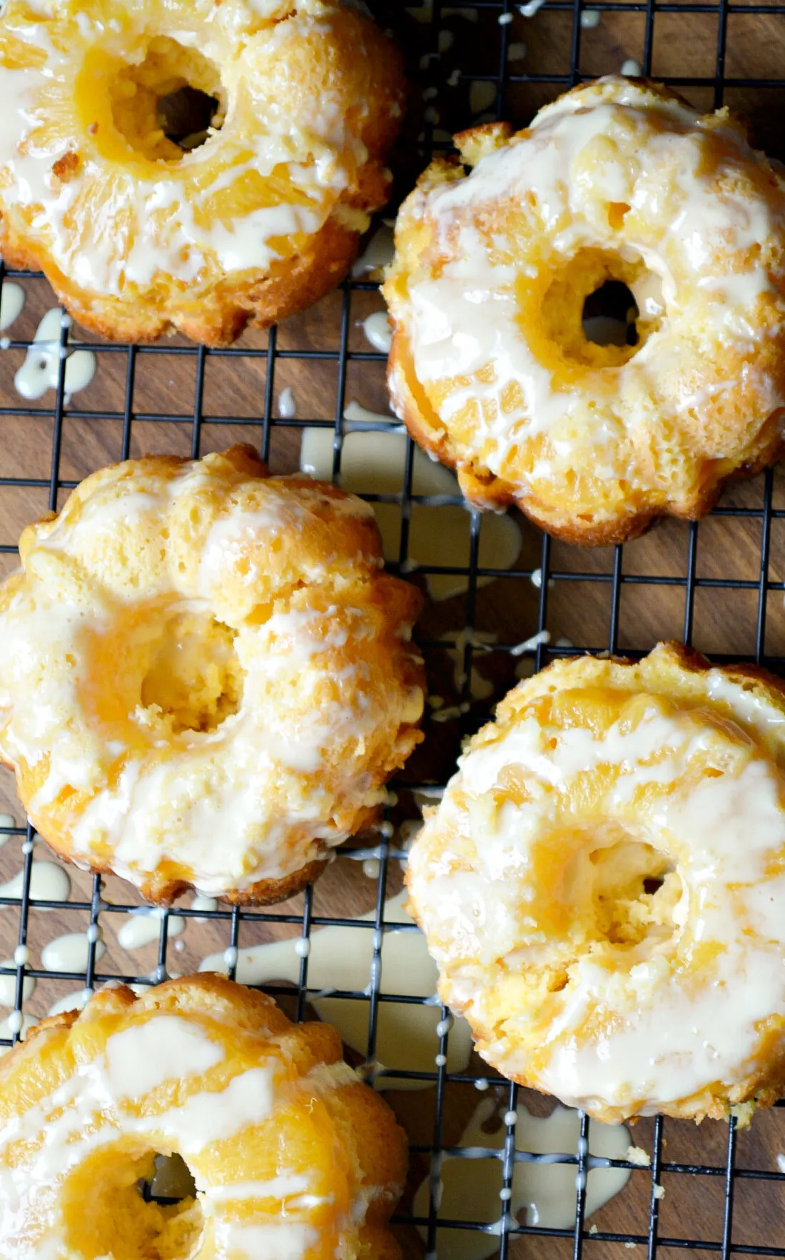 Serve these easy-to-make mini Pineapple Upside Down Cakes at holiday parties, or family get-togethers. This recipe uses a boxed cake mix for a quick and easy dessert recipe. These mini pineapple upside-down cakes are perfect for any time of the year!