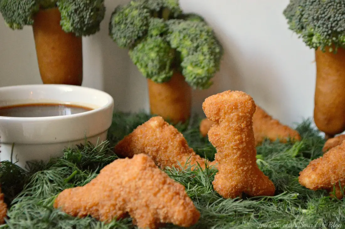 Let's start stomping these Tyson&reg; Dino Chicken Nuggets into this delicious Dino Stomp Dipping Sauce. Watch out though! There's a whole herd of them and they are coming your way!