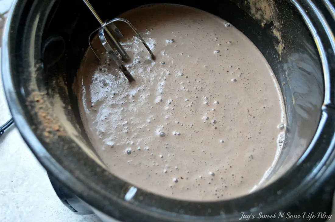 Eggnog Hot Chocolate Step 8. This decadent Eggnog Hot Chocolate is the perfect holiday drink for Christmas Parties. Made in the slow cooker, this eggnog infused hot chocolate is smooth, creamy, chocolatey, and easy to make.