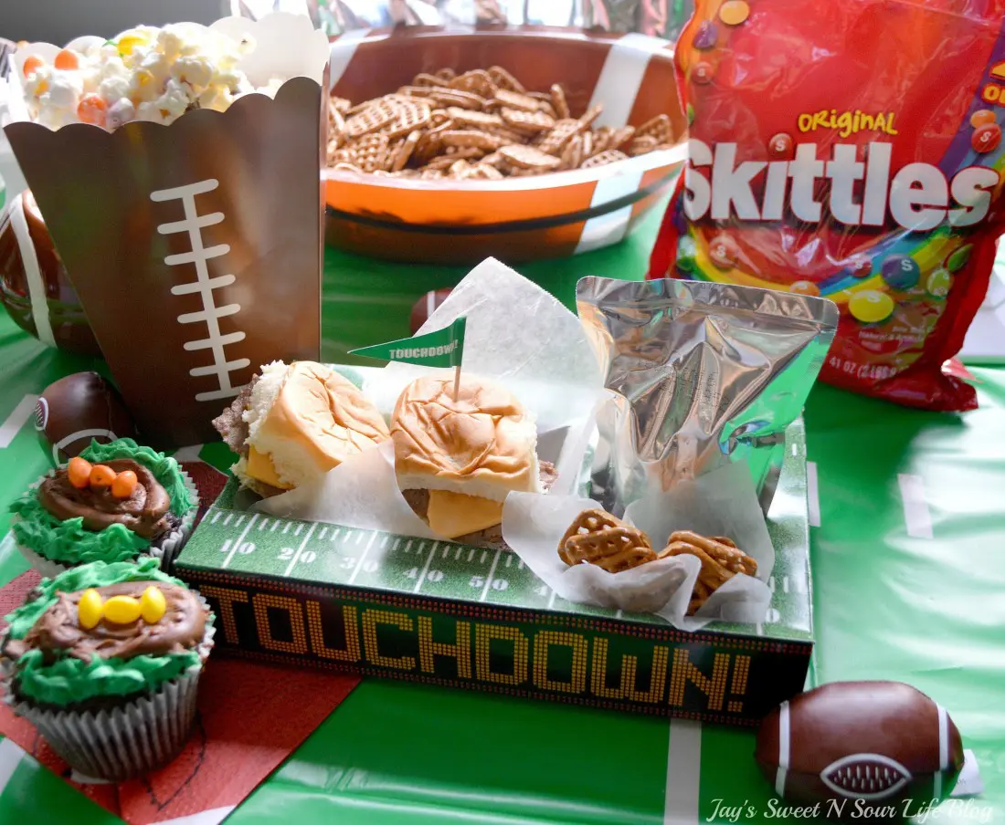 Game Day Skittles Inspired Snacks Table. Game Day Skittles Inspired Snacks that all of your friends and family can enjoy! Recipes include skittles popcorn, football cupcakes and more!