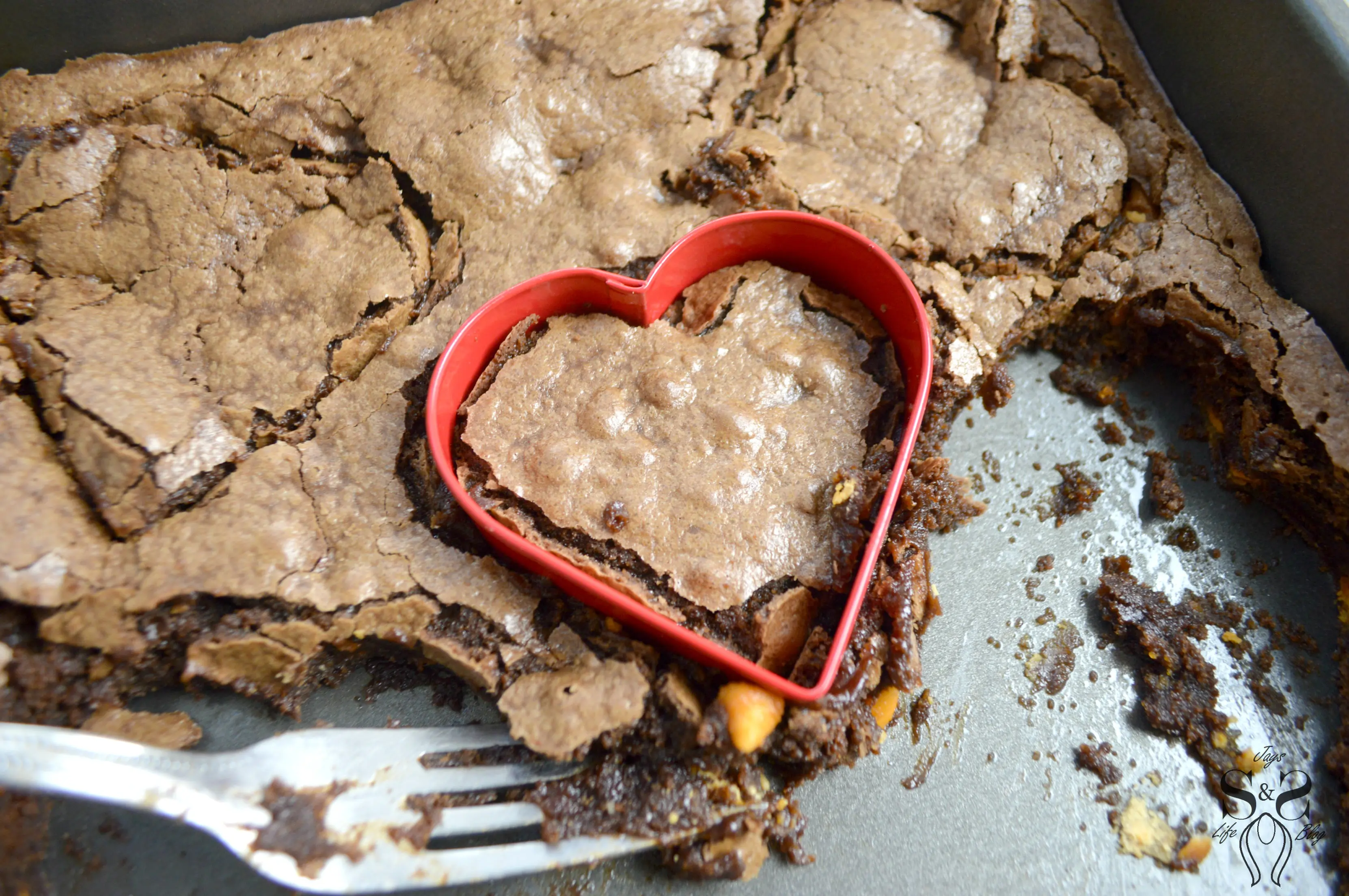 Valentine's Day Fudgy Brownies IStep 12. A from-scratch Valentine's Day Fudgy Brownie recipe, stuffed with butterscotch chips. Dipped in chocolate and then topped with candy hearts and sprinkles.