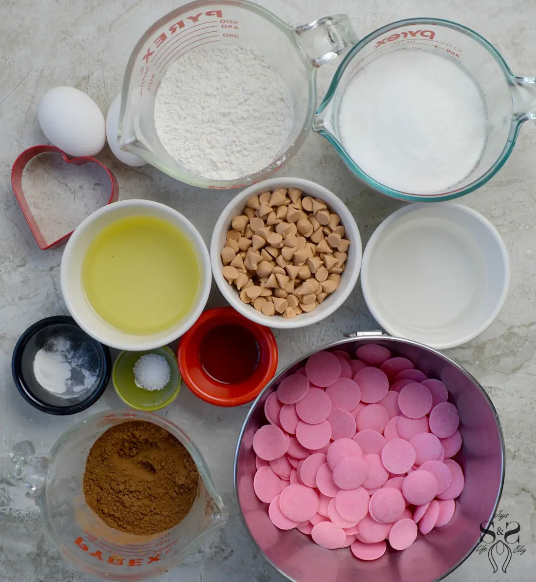 Valentine's Day Fudgy Brownies Ingredients. A from-scratch Valentine's Day Fudgy Brownie recipe, stuffed with butterscotch chips. Dipped in chocolate and then topped with candy hearts and sprinkles.