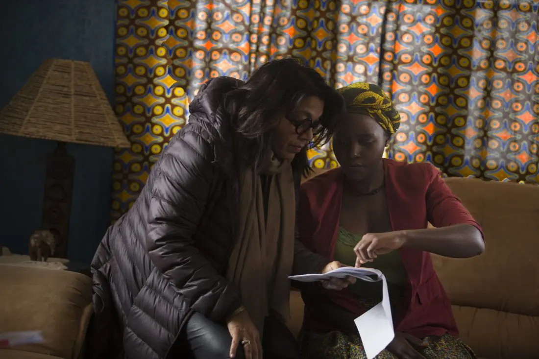 Director Mira Nair on the set of Disney's QUEEN OF KATWE with Lupita Nyong'o The film is based on a true story of a young girl from the streets of rural Uganda whose world changes when she is introduced to the game of chess, the film also star Oscar (TM) winner Lupita Nyong'o.