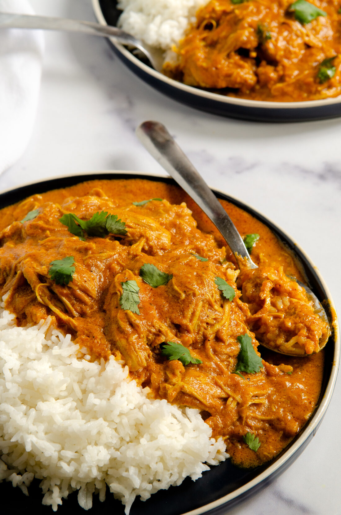 A quick and easy Indian Butter Chicken Recipe that's made in under 30 minutes. My Instant Pot Indian Butter Chicken is a buttery chicken that is smothered in a creamy tomato sauce. This flavorful dish is kid-approved and tastes even better as leftovers!