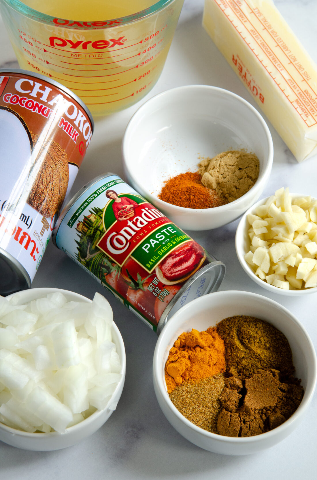 A quick and easy Indian Butter Chicken Recipe that's made in under 30 minutes. My Instant Pot Indian Butter Chicken is a buttery chicken that is smothered in a creamy tomato sauce. This flavorful dish is kid-approved and tastes even better as leftovers!