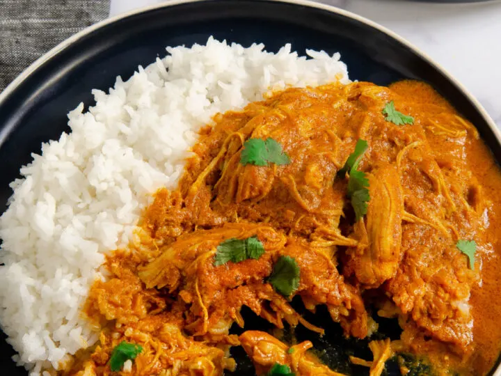 A quick and easy Indian Butter Chicken Recipe that's made in under 30 minutes. My Instant Pot Indian Butter Chicken is a buttery chicken that is smothered in a creamy tomato sauce. This flavorful dish is kid-approved and tastes even better as leftovers!