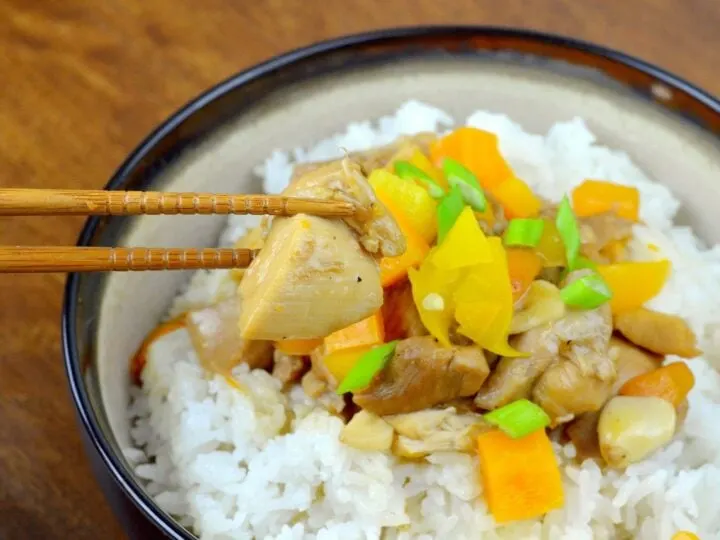 An easy, better than takeout Pressure Cooker Orange Chicken recipe, featuring fresh vegetables, oranges, chicken, traditional Chinese sauces, and spices. This easy instant pot dinner recipe is the perfect weeknight dinner for busy families.