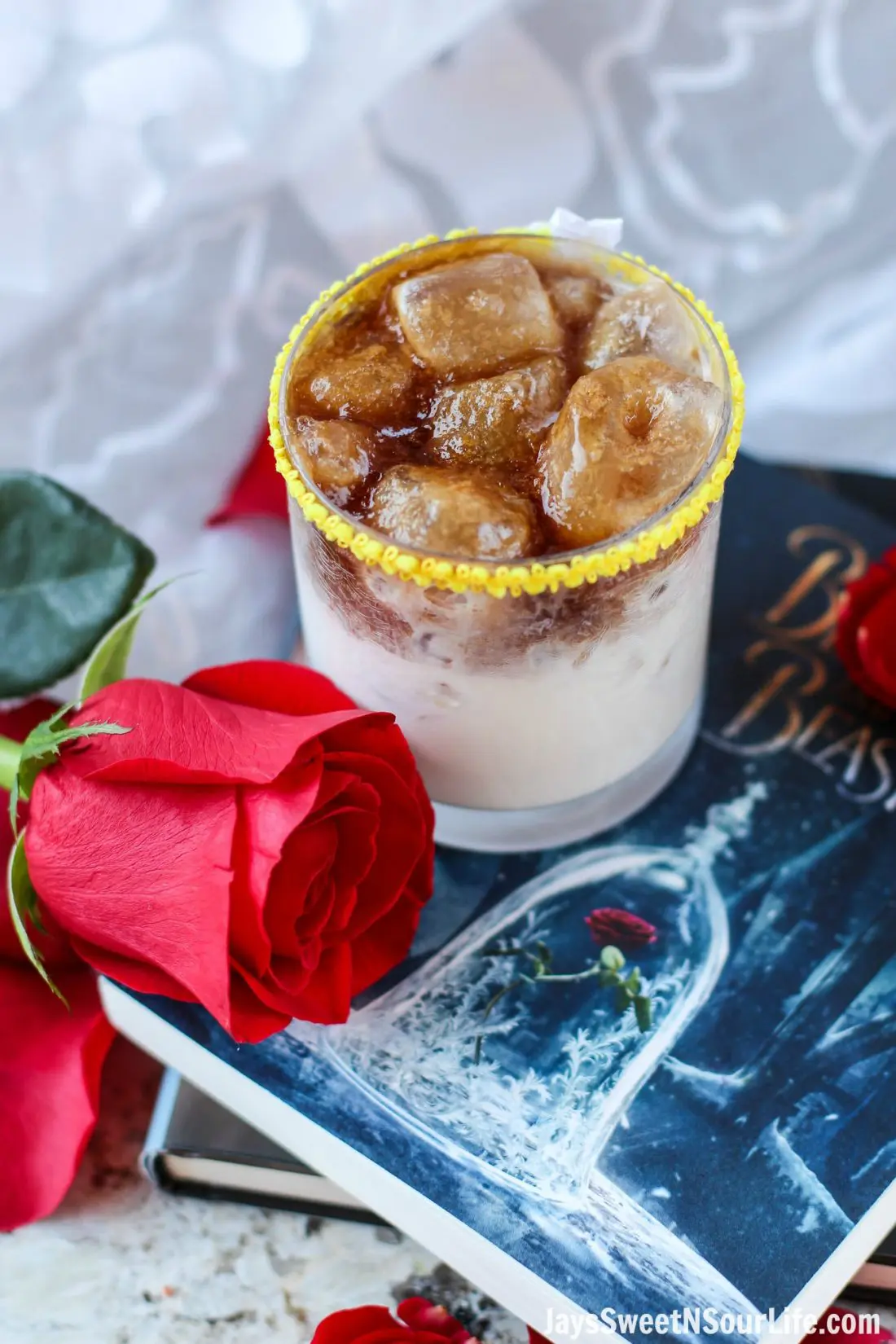 Beauty and the Beast Cocktail Rose. Break the curse with this Disney inspired Beauty and the Beast Cocktail. Made with layers of Kringle Cream Liqueur and Coffee Soda, this simple but elegant cocktail recipe delivers a delicious big flavor.