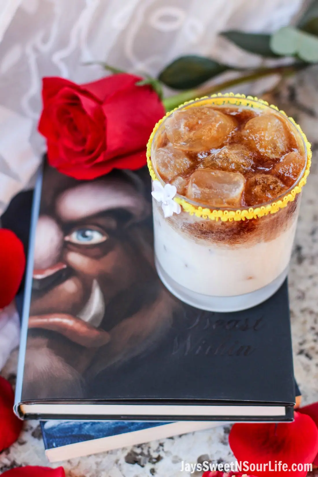 Beauty and the Beast Cocktail. Break the curse with this Disney inspired Beauty and the Beast Cocktail. Made with layers of Kringle Cream Liqueur and Coffee Soda, this simple but elegant cocktail recipe delivers a delicious big flavor.