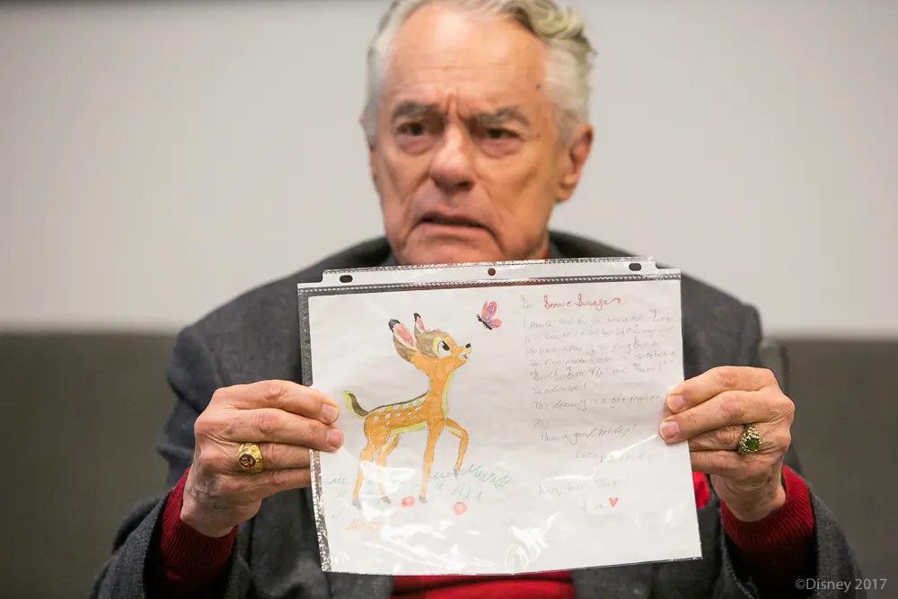 Donnie Dunagan showing a photo of fan mail he received with a hand drawn photo of Bambi. Shown during Interview With The Voices of Disney's Bambi and Thumper . 