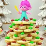 Trolls Holiday Tree Sugar Cookies Poppy. Bake, stack, and decorate these Trolls inspired Sugar Cookies. Decked out in fun Trolls Holiday themed colors, this fun Troll's Sugar Cookie Christmas Tree is a fun recipe and Christmas craft all in one!