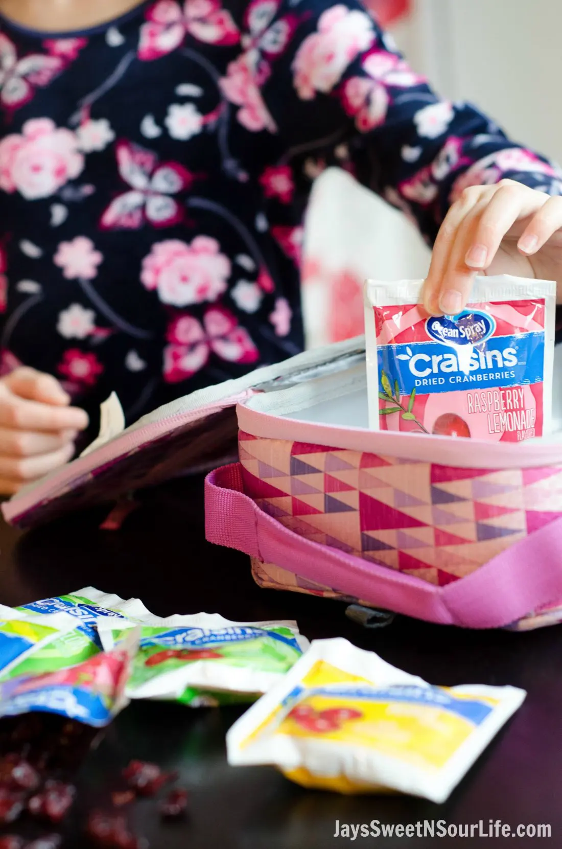 5 tips for the on the go mom. Little Girl Packing Ocean Spray Tropical and Fruit Splash flavored Craisins For school Lunch.