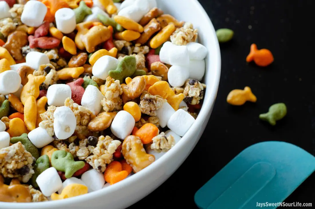 Goldfish crackers are my go-to! My families favorite on the go trail mix is sweet and oh so delicious. Try this Goldfish Trail Mix and take it on the go with your family to theme parks, parks, or your back yard.