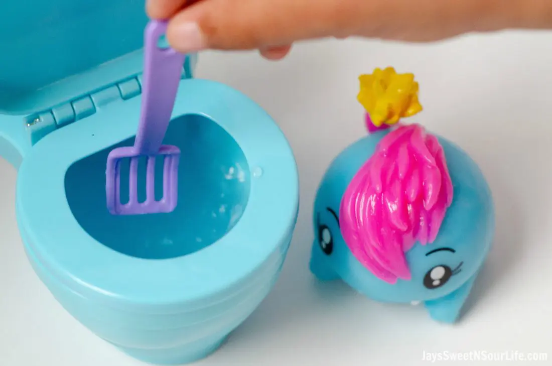 Pooparoos Toy With Scooper in Toilet. Pooparoos are full of fun surprises and tons of fun for all.