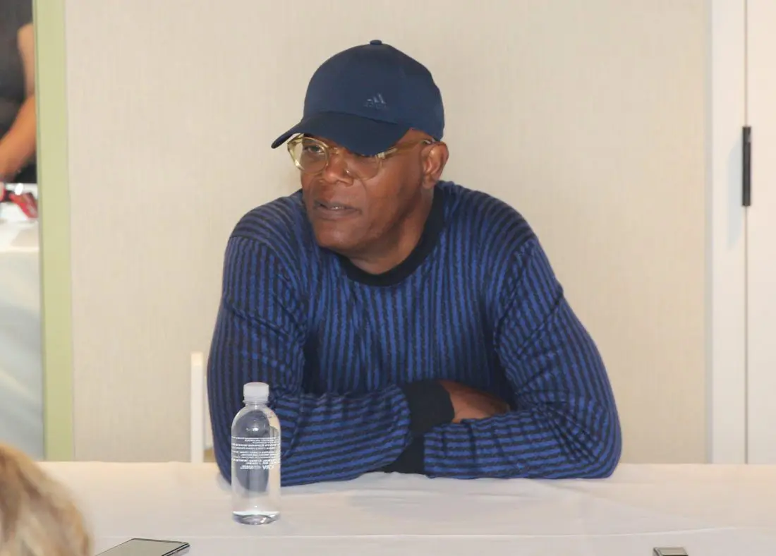 Samuel L. Jackson in Incfredibls2Event Press Junket looking sideways smiling. The Incredibles 2 film will be in theaters everywhere June 15th.