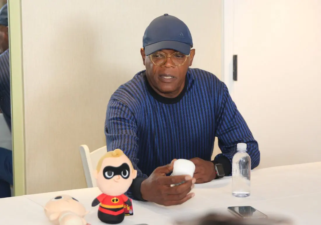 Samuel L. Jackson in Incfredibls2Event Press Junket holding his Frozone Toy Funko Pop. The Incredibles 2 film will be in theaters everywhere June 15th.