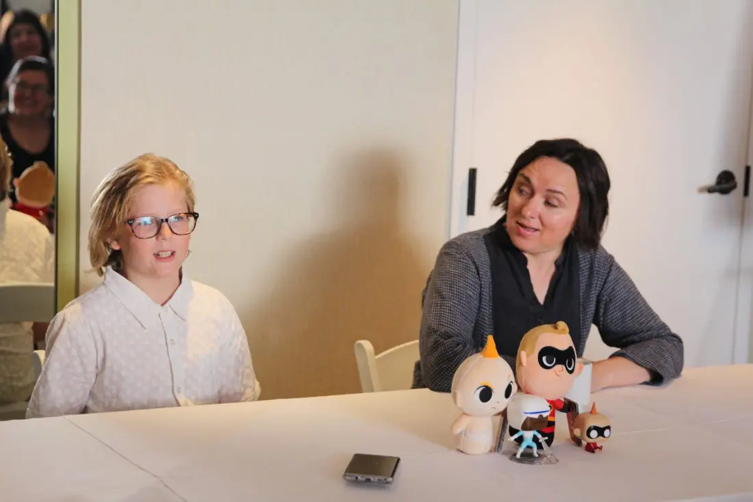 Incredibles 2 Interview with Sarah Vowell & Huck Milner both speaking at table. Voice actors of Dash and Violet Parr Tell All in this revealing exclusive interview.