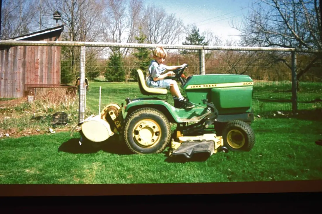 Chris Houghton creator of Big City Greens as a child sitting on a lawn mower. Big City Greens premieres June 18 at 9:30 a.m. on Disney Channel, DisneyNOW, and Disney Channel VOD.