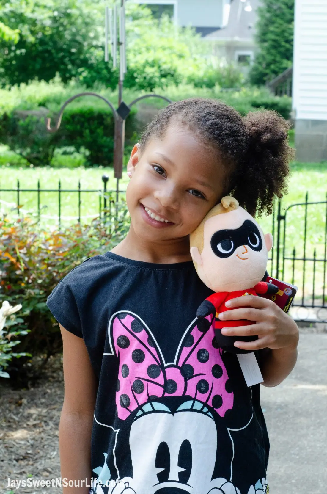African American Girl holding Incredibles Mr Incredible Plush Doll. New Disney Pixars Incredibles 2 Toys + More | Incredibles 2 Gift Guide 