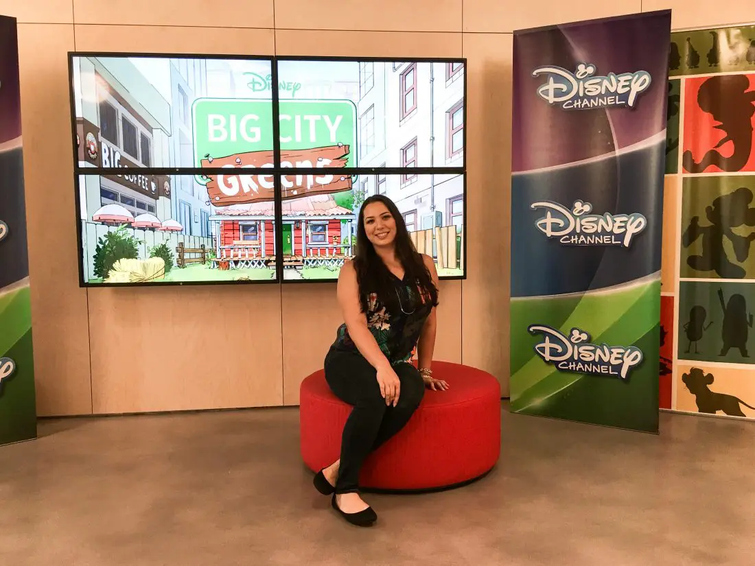 Jessica Simms Jays Sweet N Sour Life at Disney Channel Building infront of Big City Greens Sign. Read my full article on Disney Channel's Big City Greens, A Peek Inside This NEW 2 Funny + 1 Part Heart Series.