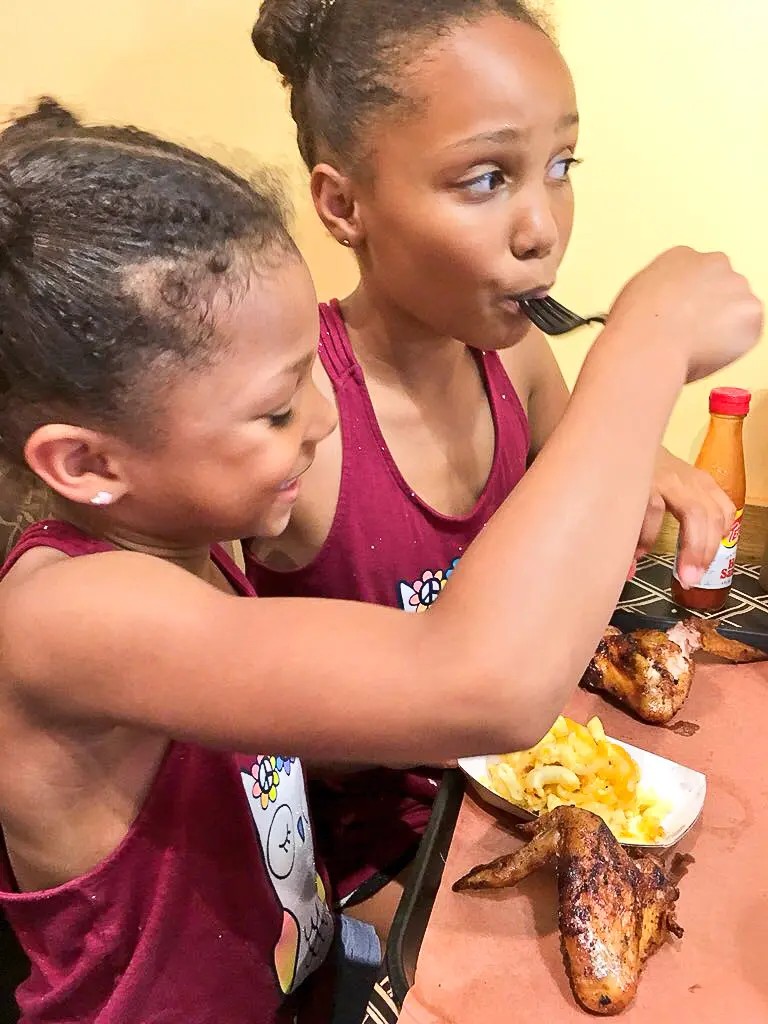 The Smoke Pit - Visit Cabarrus County Girls Eating Together. A Large Families Adventure Guide To Cabarrus County - North Carolina - via JaysSweetNSourLife.com.