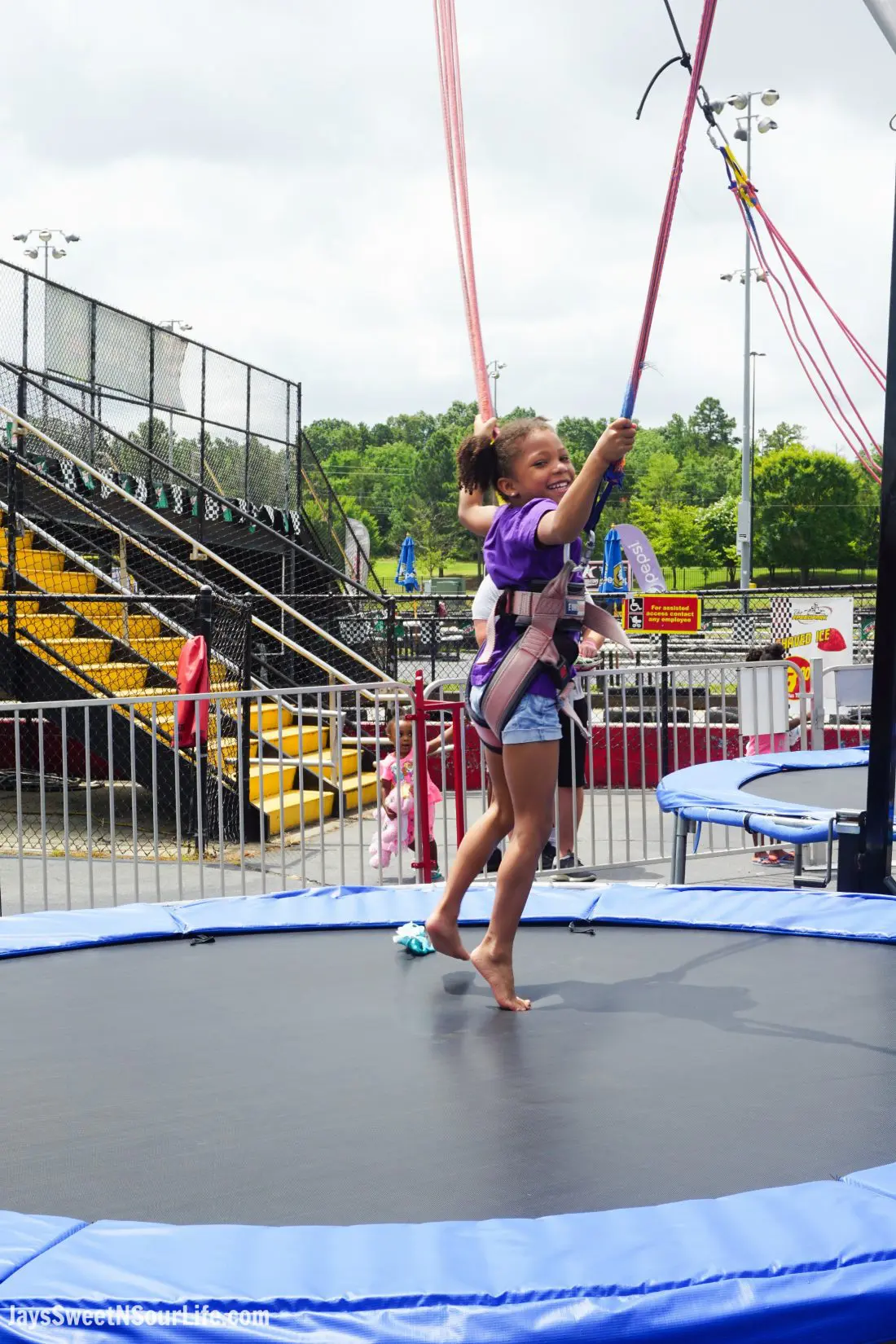 SpeedPark - Visit Cabarrus County Track Bungee Jumping Girl. A Large Families Adventure Guide To Cabarrus County - North Carolina - via JaysSweetNSourLife.com.