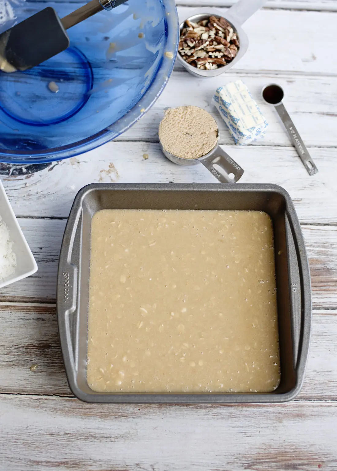 Oatmeal Cake with Coconut Pecan Frosting Step 9 let set in pan. Fill your home with the smell of an easy to make Grandma's recipe Oatmeal Cake with Coconut Pecan Frosting.