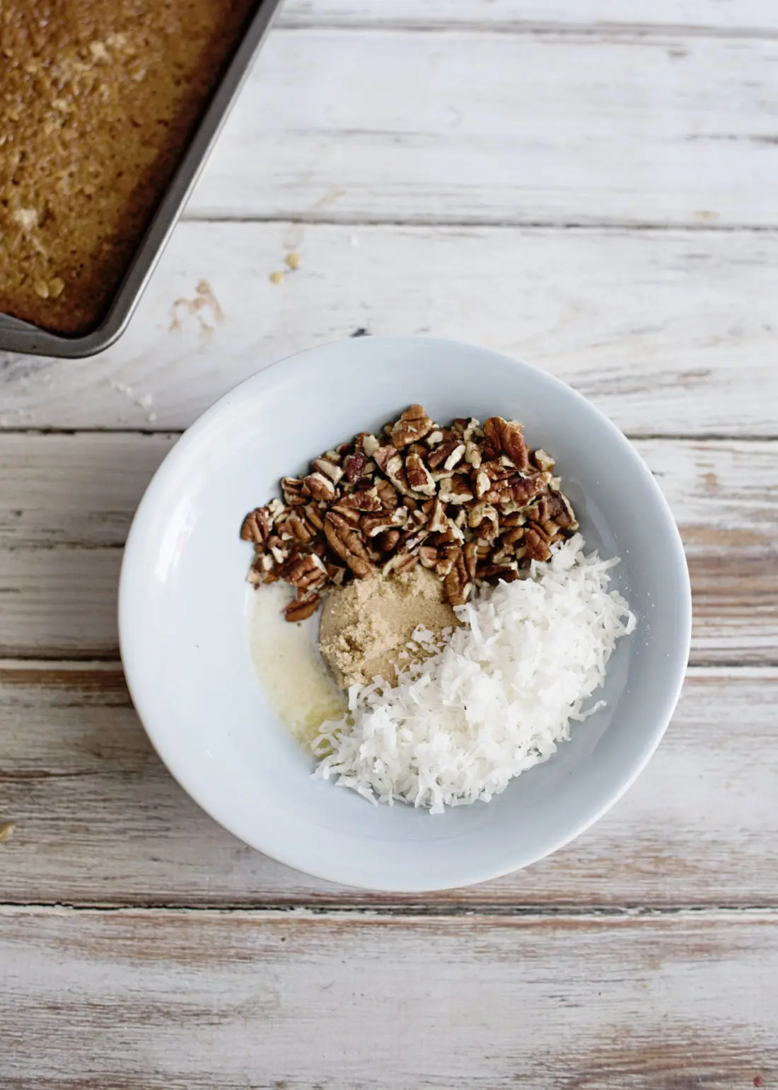 Oatmeal Cake with Coconut Pecan Frosting Step 10 pour coconut, brown sugar and pecans into bowl. Fill your home with the smell of an easy to make Grandma's recipe Oatmeal Cake with Coconut Pecan Frosting.