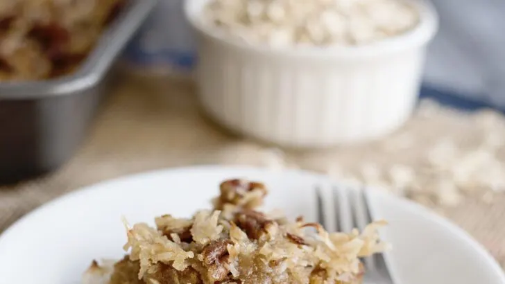 Oatmeal cake with coconut pecan frosting is a classic snack cake that has been around for many years. try this slice of Oatmeal Cake with Pecan Frosting at your next get together.