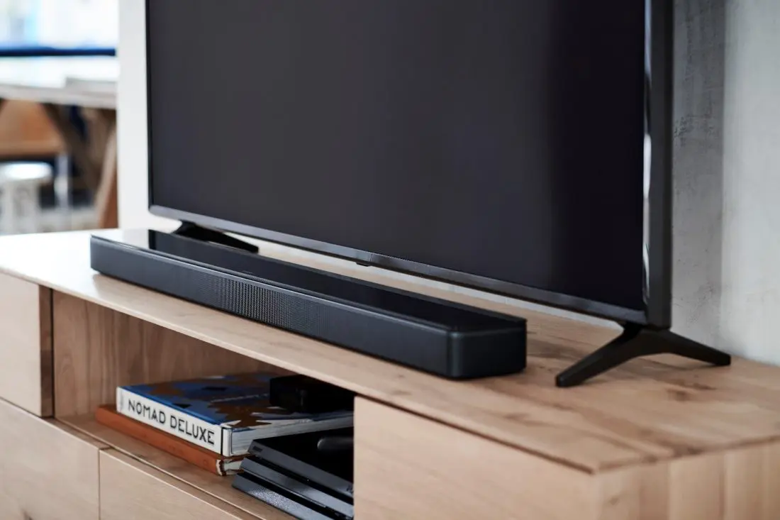 The stylish Bose Soundbar 500 is meant to be heard, not seen. Its thin profile fits discreetly under the TV screen, while its powerful acoustics fill the room with sound.