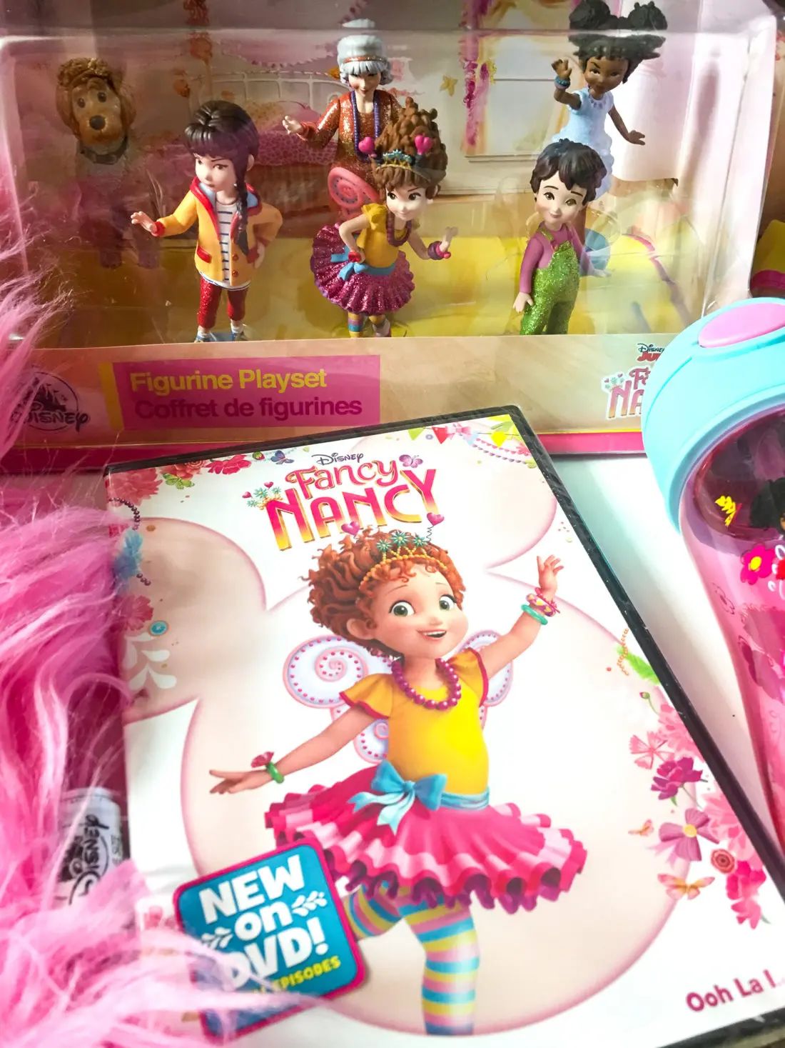 Disney Junior Fancy Nancy DVD and Figure Set. Grab some glitter, add a dash of &ldquo;ooh la la,&rdquo; sprinkle in original songs and Voil&agrave;! Get set to pour on the fun with Fancy Nancy in her newest DVD from Disney Junior.