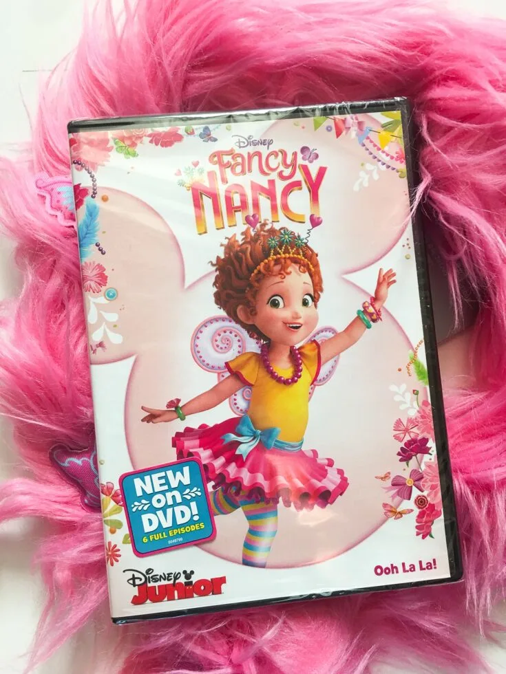 Disney Junior Fancy Nancy DVD. Grab some glitter, add a dash of &ldquo;ooh la la,&rdquo; sprinkle in original songs and Voil&agrave;! Get set to pour on the fun with Fancy Nancy in her newest DVD from Disney Junior.
