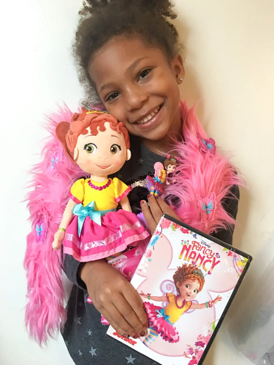 Esuun Fancy Nancy DVD Doll Figure. Grab some glitter, add a dash of &ldquo;ooh la la,&rdquo; sprinkle in original songs and Voil&agrave;! Get set to pour on the fun with Fancy Nancy in her newest DVD from Disney Junior.