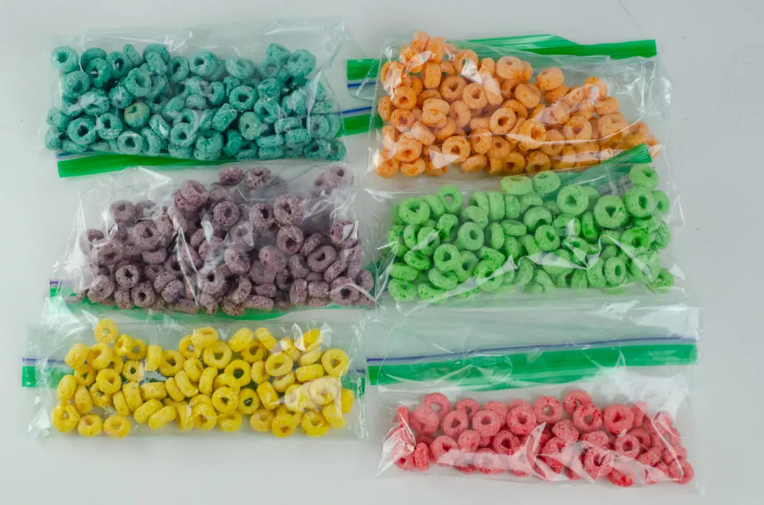 Christmas Ornament Ideas for Kids Using Cereal Sorted Colors. It's time to let the kids be the boss for this new kid-friendly Christmas DIY. Rethink Cereal with somr my Christmas Ornament Ideas for Kids Using Cereal.