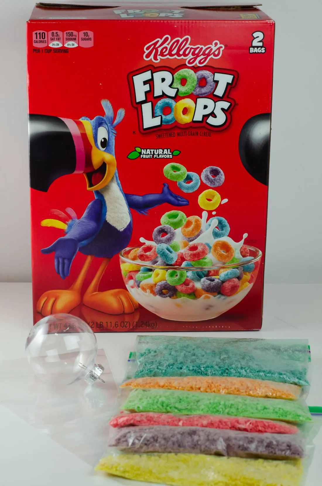Christmas Ornament Ideas for Kids Using Cereal Abstract Art Supplies. It's time to let the kids be the boss for this new kid-friendly Christmas DIY. Rethink Cereal with somr my Christmas Ornament Ideas for Kids Using Cereal.