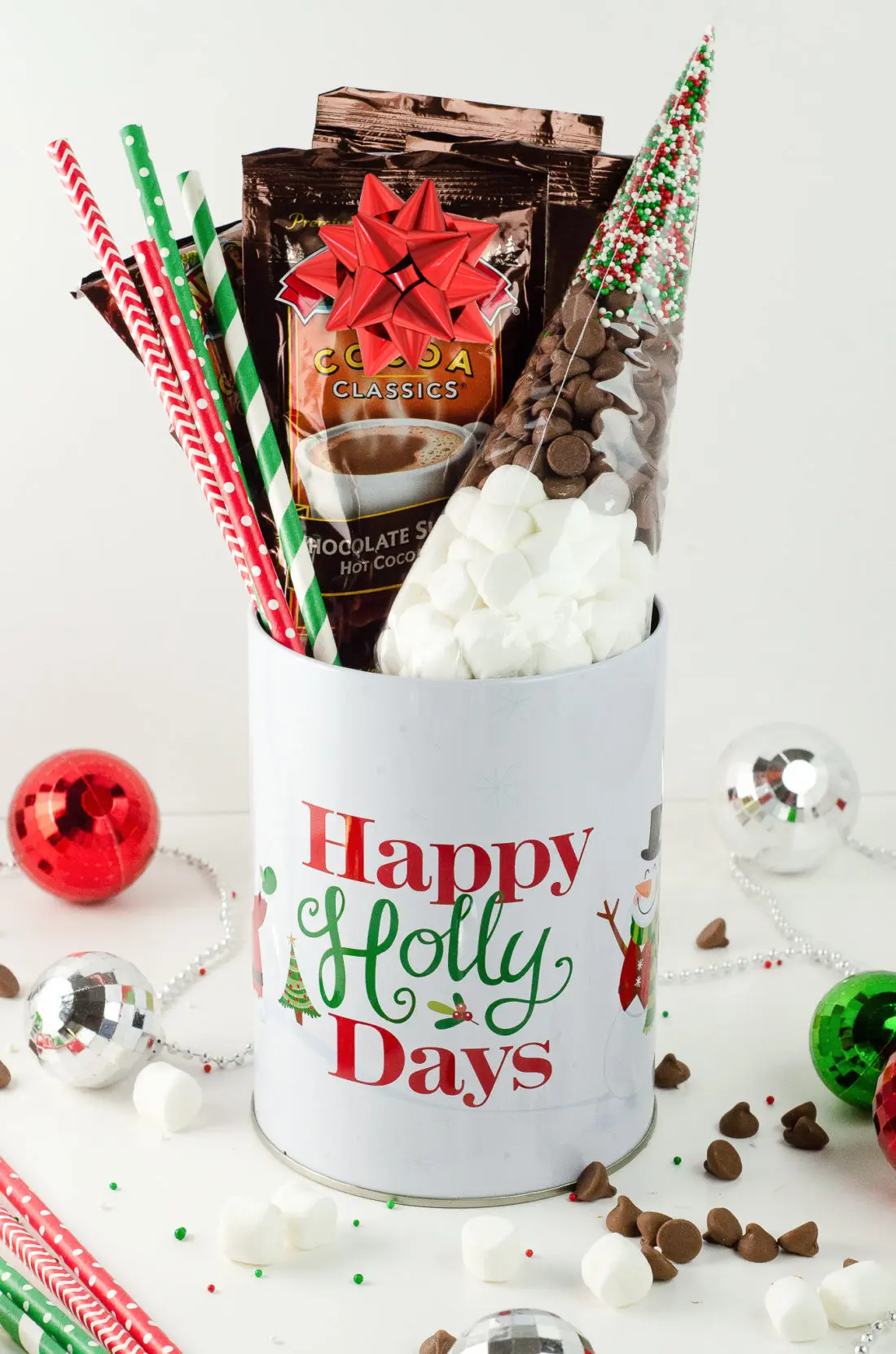 Holiday Teachers Gift Ideas Hot Chocolate. Nothing says "Happy Holidays" like a Holiday Teachers Gift. Read more about my three fun Holiday Teachers Gift Ideas for your family to try this holiday season.