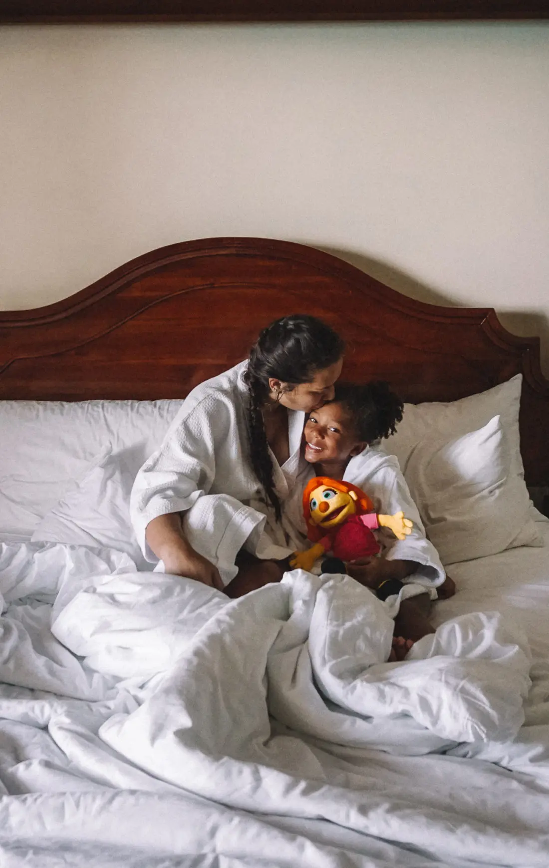 Oceanfront Family Suite Beaches Resorts in Turks and Caicos Mom and Daughter Cuddling In Bed. Paradise does exist, and it's only a plane ride away. Take a look inside our suite in this Oceanfront Family Suite Room Tour at Beaches Resorts in Turks and Caicos.