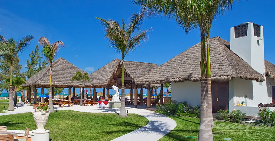 Restaurant Barefoot by the Sea Side View. Read more of my Barefoot By The Sea Restaraunt at Beaches Turks and Caicos Review On My Blog. With the sparkling Sea just steps away, spectacular Caribbean vistas and cool sea breezes abound.