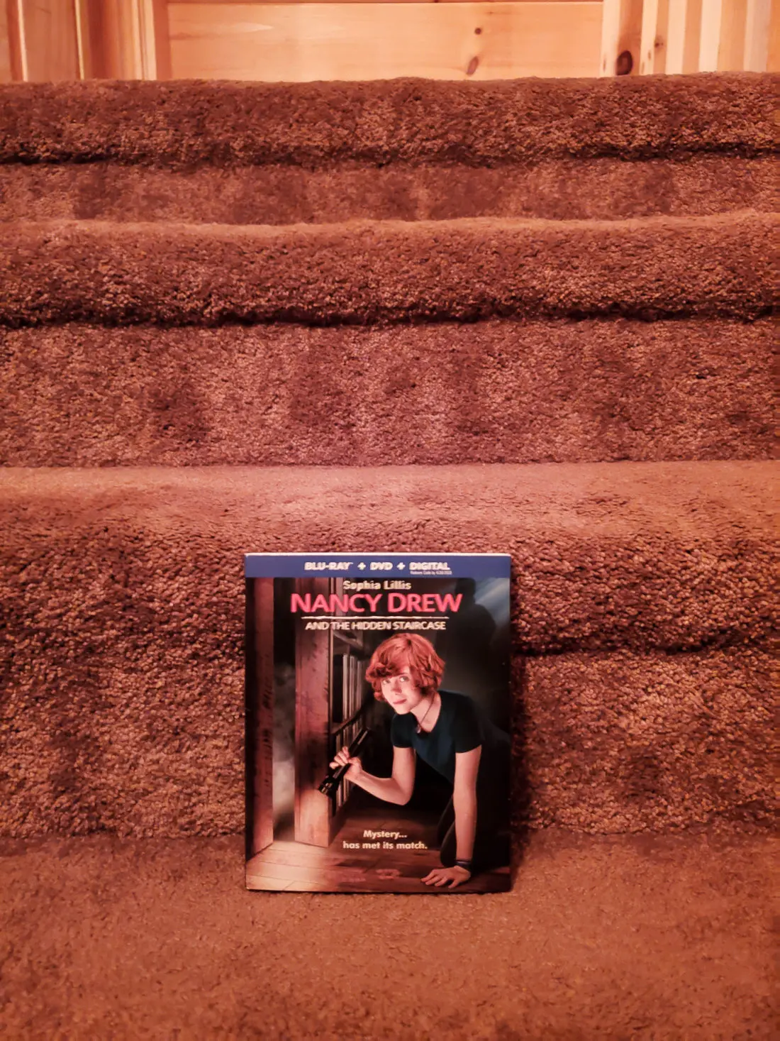 Nancy Drew And The Hidden Staircase DVD on Stairs. Nancy Drew And The Hidden Staircase film is heading home on Digital March 26, 2019 and on Blu-ray&trade; Combo Pack & DVD on April 2, 2019! If you haven't heard about the newest film in the Nancy Drew series then look no further. Check out all of the info below on what to expect with this family-friendly film.