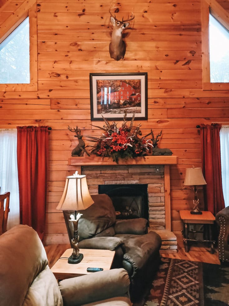 The Mountain Charm Eagles Ridge Resorts Cabin Living Room. The Mountain Charm 3 Bedroom Cabin at Eagles Ridge Resort offers ample space and luxury. The perfect place to stay during a family vacation to Pigeon Forge, TN.