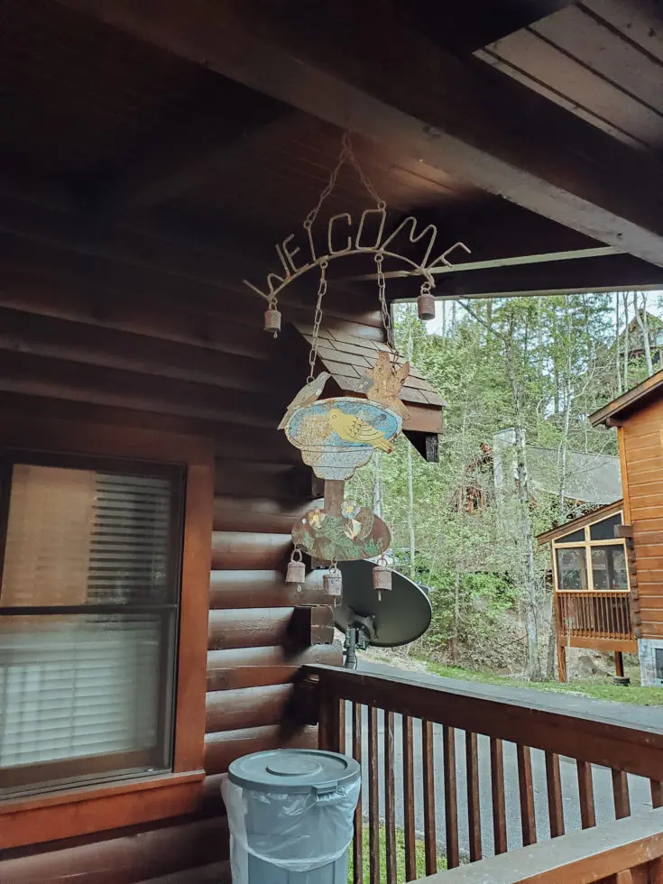 The Mountain Charm Eagles Ridge Resorts Cabin Front Porch Welcome Sign. The Mountain Charm 3 Bedroom Cabin at Eagles Ridge Resort offers ample space and luxury. The perfect place to stay during a family vacation to Pigeon Forge, TN.